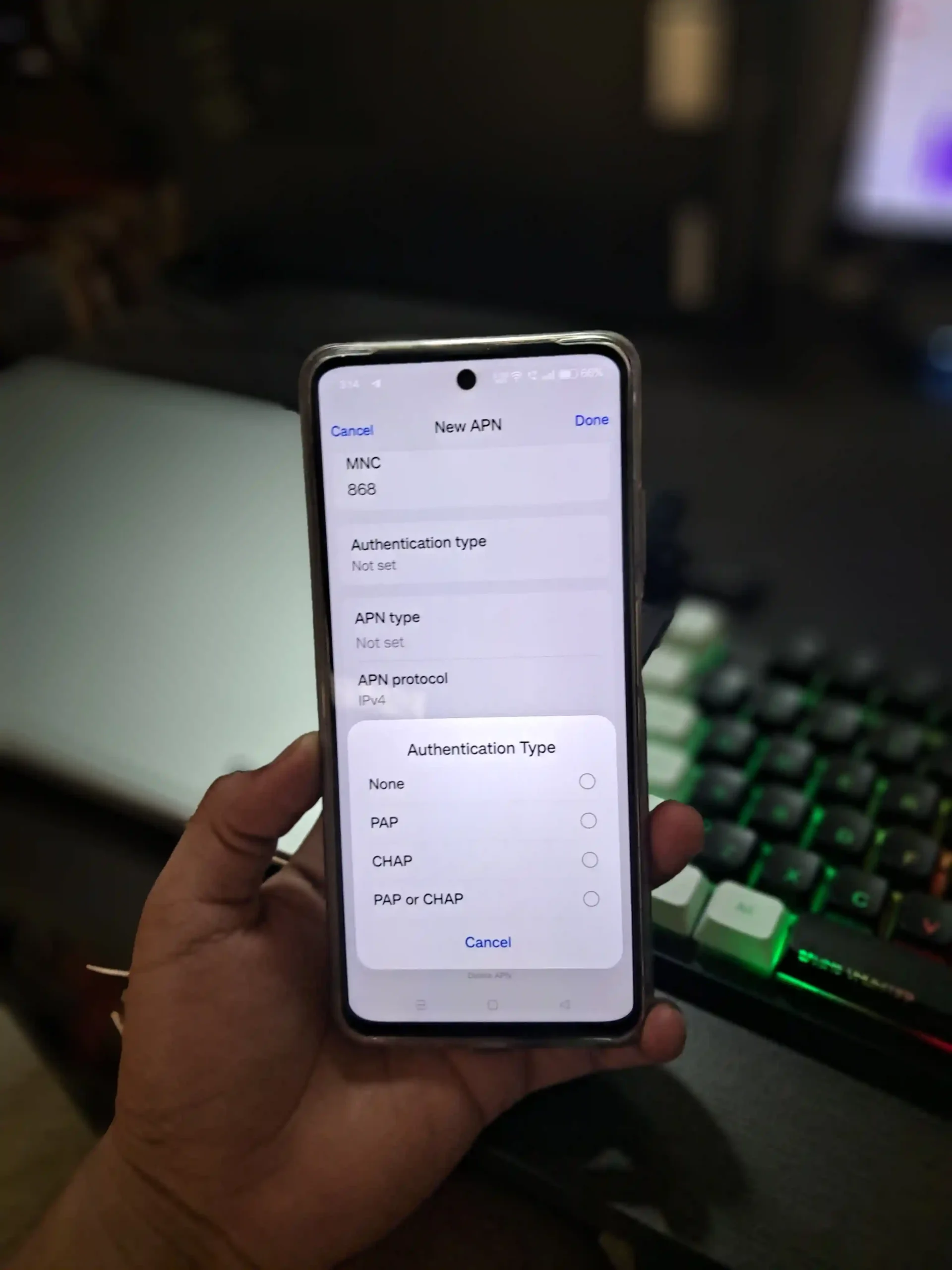 image of android in hands with authentication type menu opened with pap and chap selection